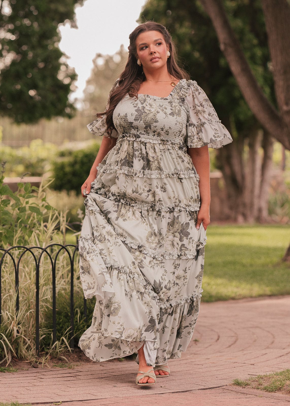chic size inclusive model wearing JessaKae Faeryn Dress