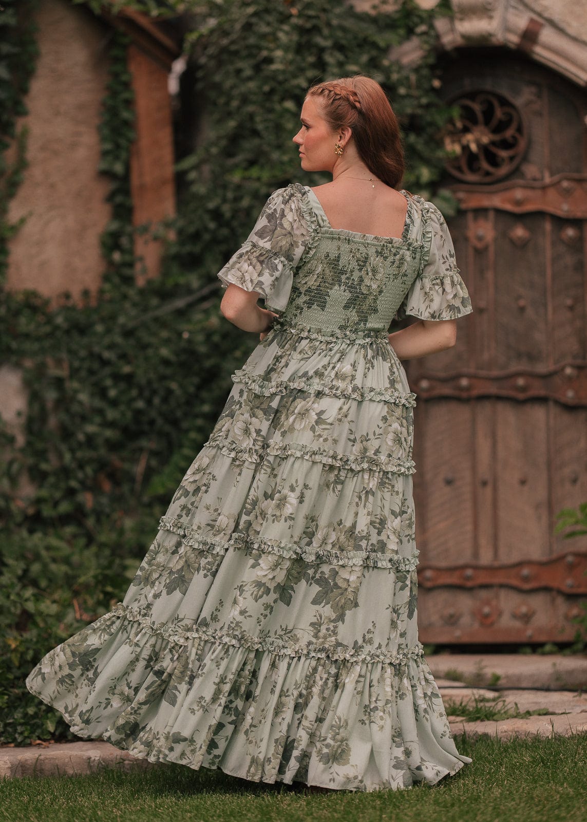 chic size inclusive model wearing JessaKae Faeryn Dress