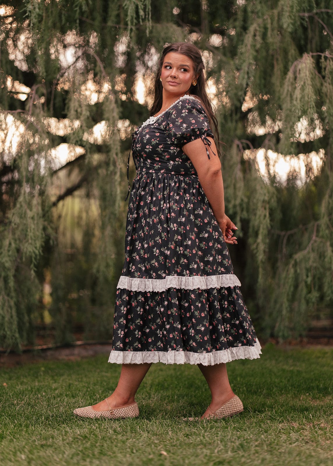 chic size inclusive model wearing JessaKae Fawn Dress