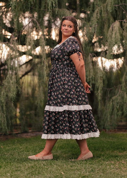 chic size inclusive model wearing JessaKae Fawn Dress