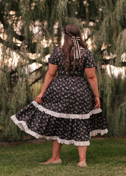 chic size inclusive model wearing JessaKae Fawn Dress