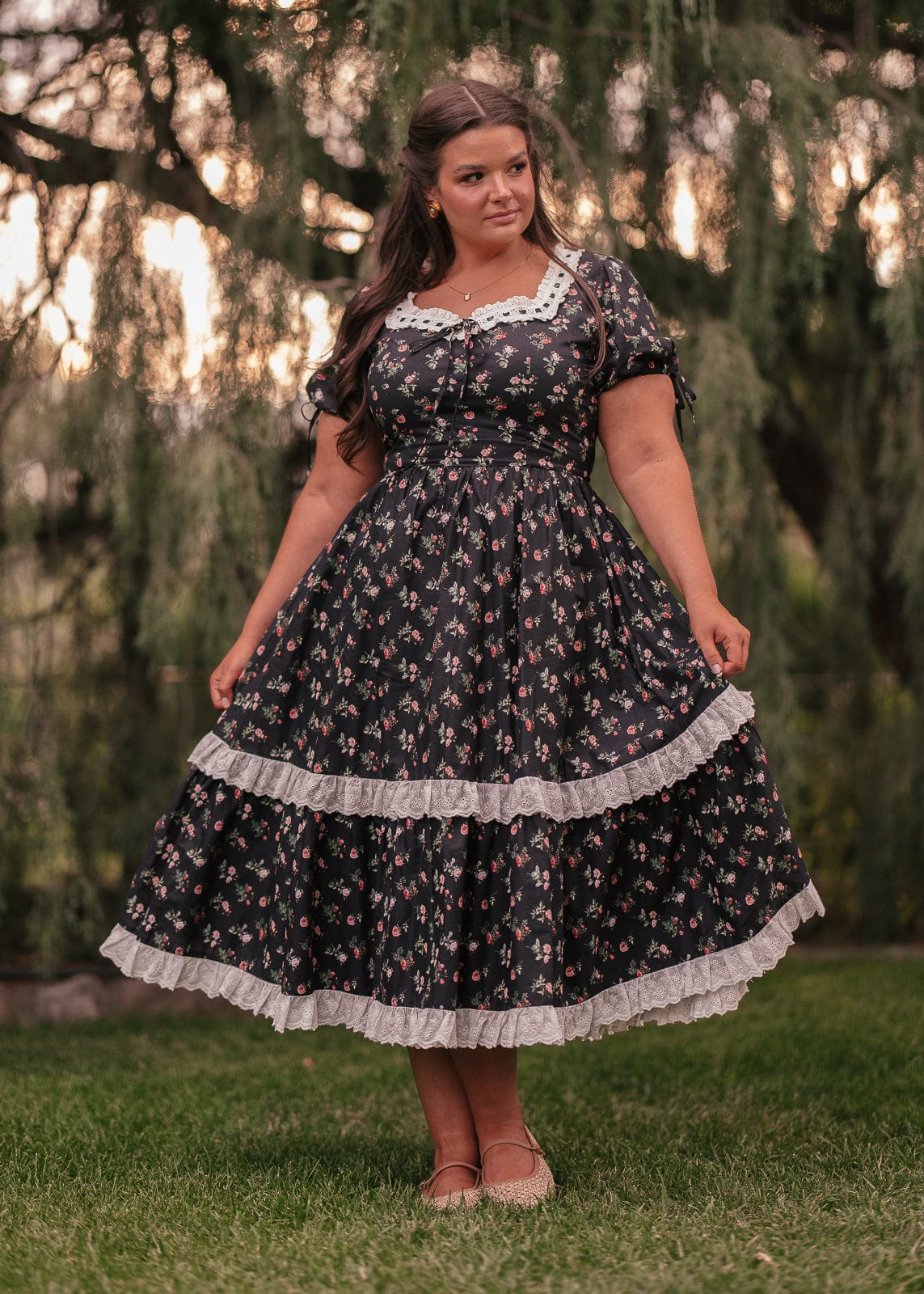 chic size inclusive model wearing JessaKae Fawn Dress