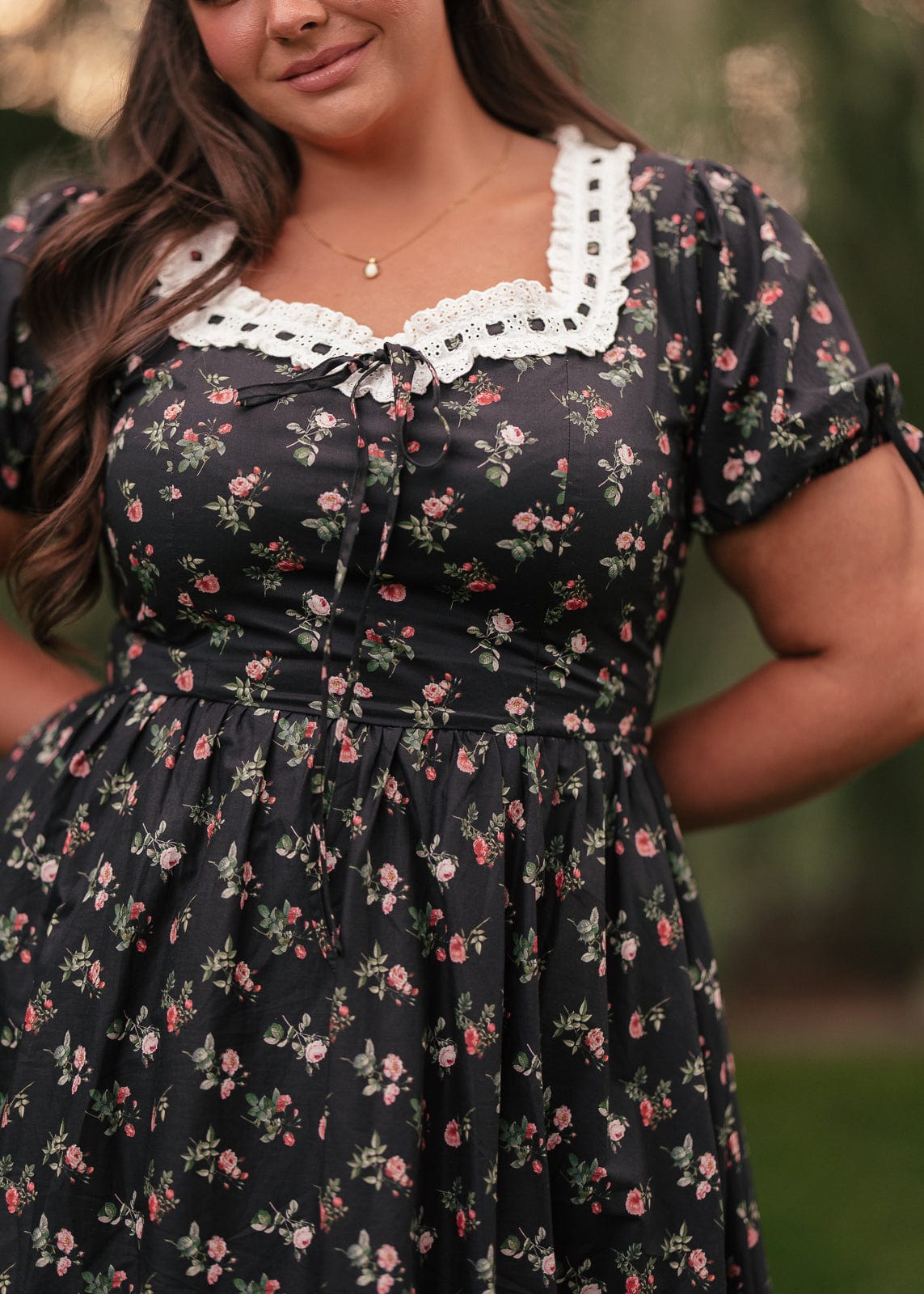 chic size inclusive model wearing JessaKae Fawn Dress