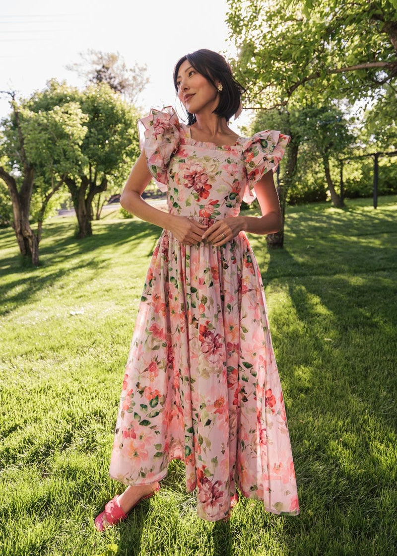 chic size inclusive model wearing JessaKae Fleur Dress Dresses
