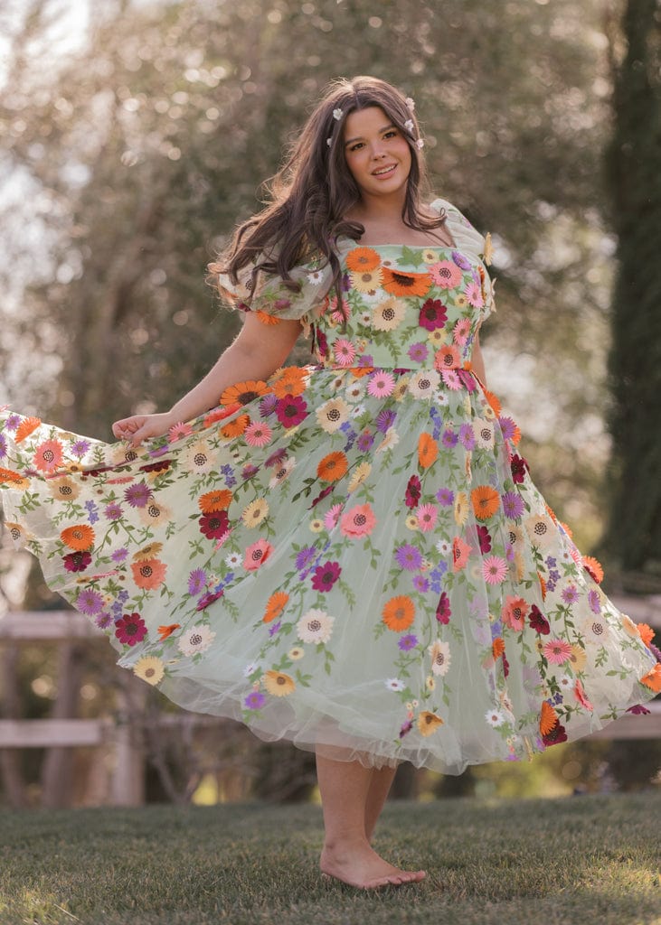 chic size inclusive model wearing JessaKae Garden Waltz Dress