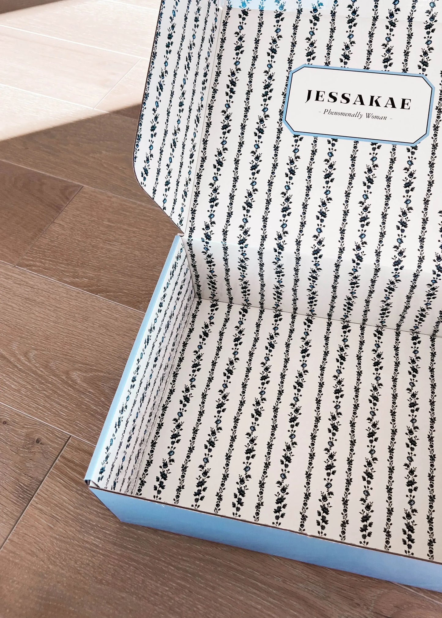 chic size inclusive model wearing JessaKae Gift Box Blue