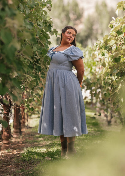 chic size inclusive model wearing JessaKae Giselle Dress