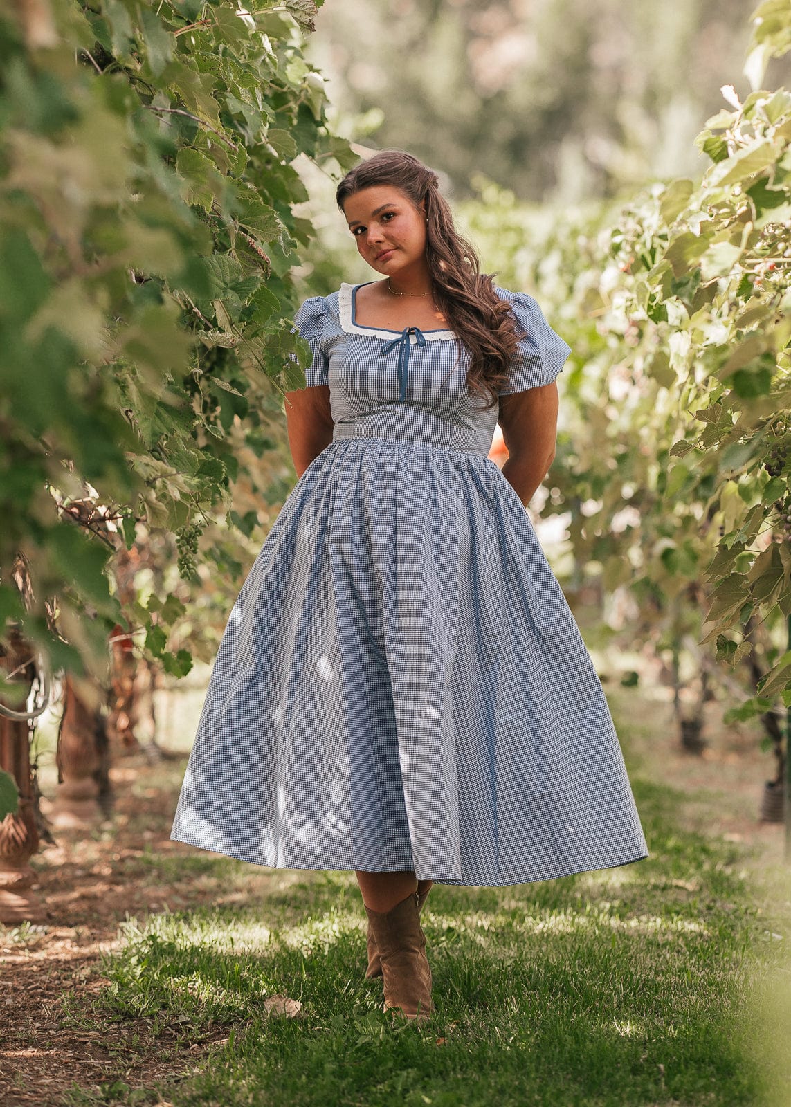 chic size inclusive model wearing JessaKae Giselle Dress