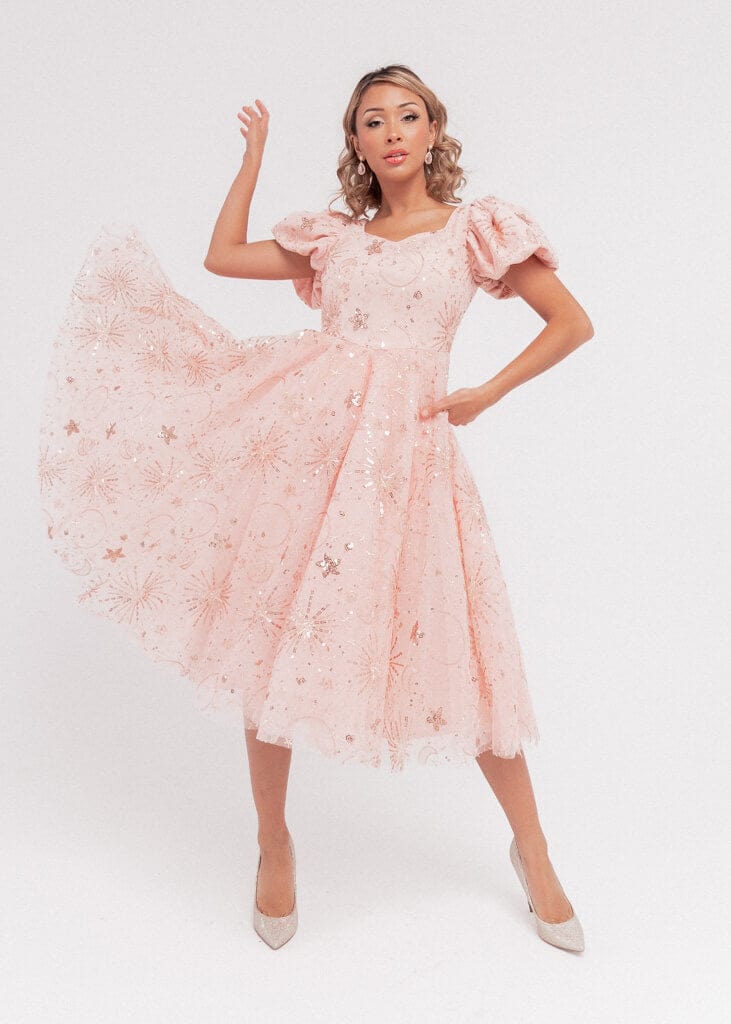 chic size inclusive model wearing JessaKae Glinda Dress Dresses Dress_Wishful Pink / XXS