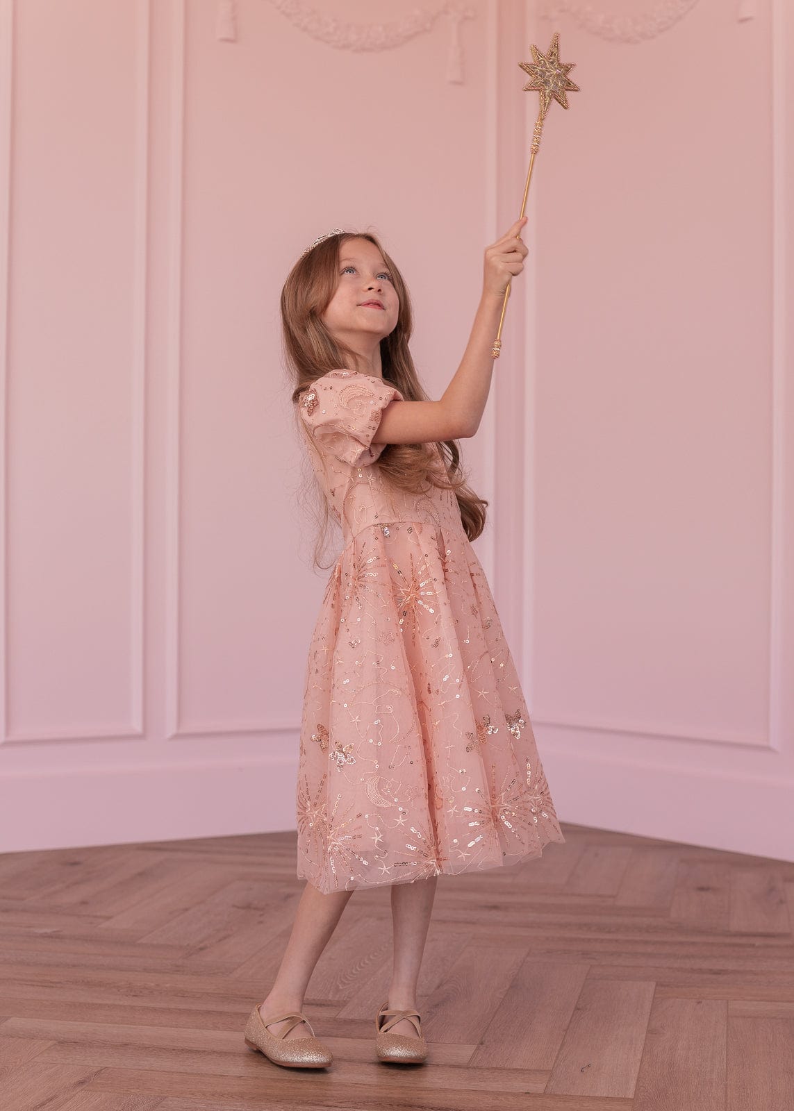 chic size inclusive model wearing JessaKae Glinda Girls Dress