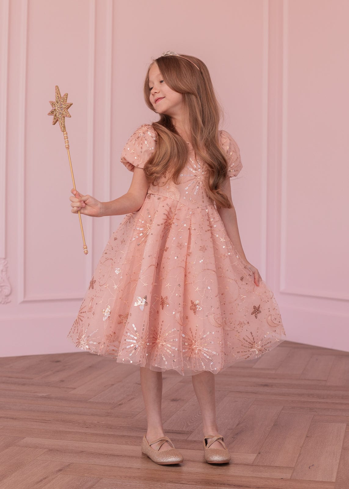 chic size inclusive model wearing JessaKae Glinda Girls Dress
