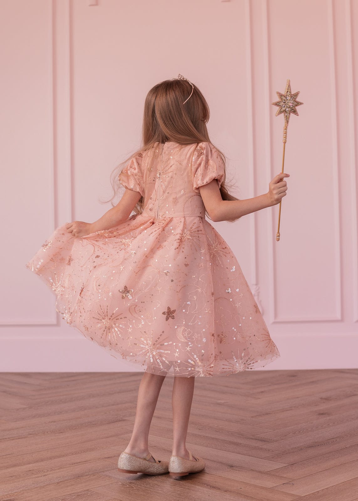 chic size inclusive model wearing JessaKae Glinda Girls Dress