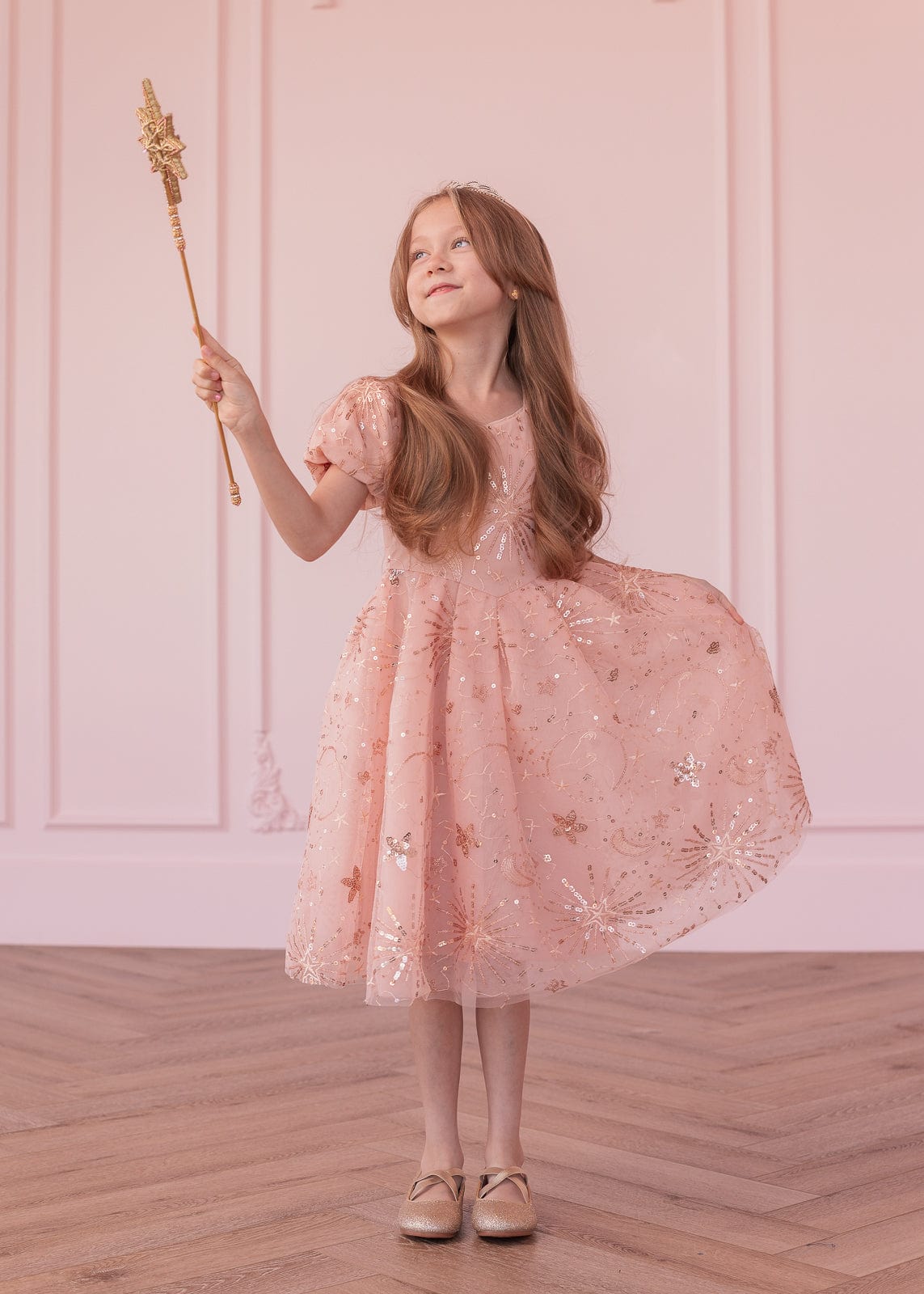 chic size inclusive model wearing JessaKae Glinda Girls Dress