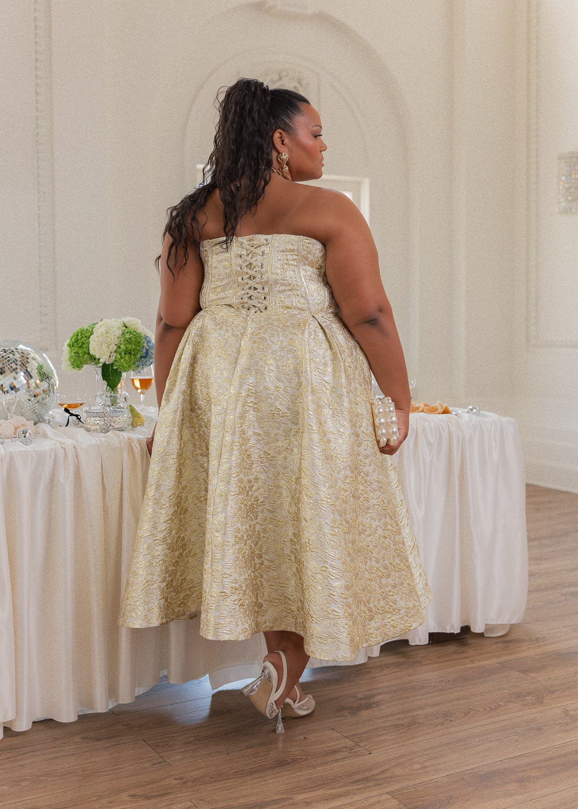 chic size inclusive model wearing JessaKae Gloria Dress