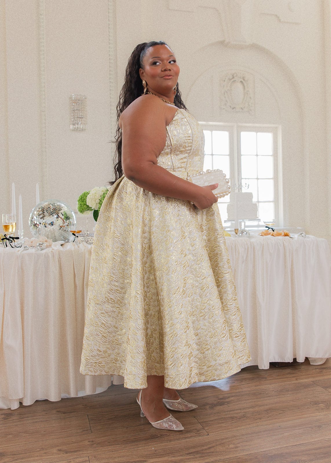 chic size inclusive model wearing JessaKae Gloria Dress