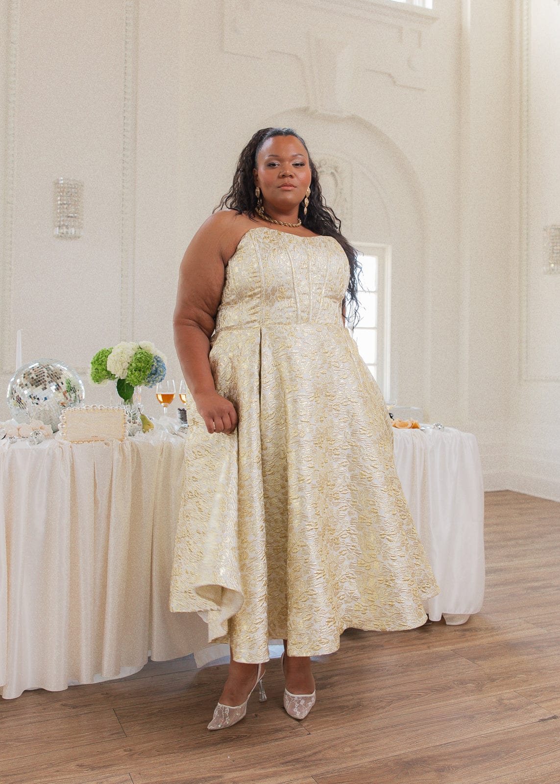 chic size inclusive model wearing JessaKae Gloria Dress