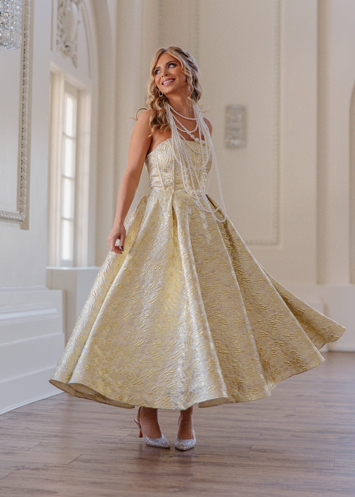 chic size inclusive model wearing JessaKae Gloria Dress