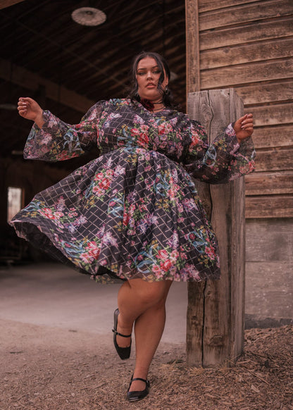 chic size inclusive model wearing JessaKae Gretel Dress Gretel Black