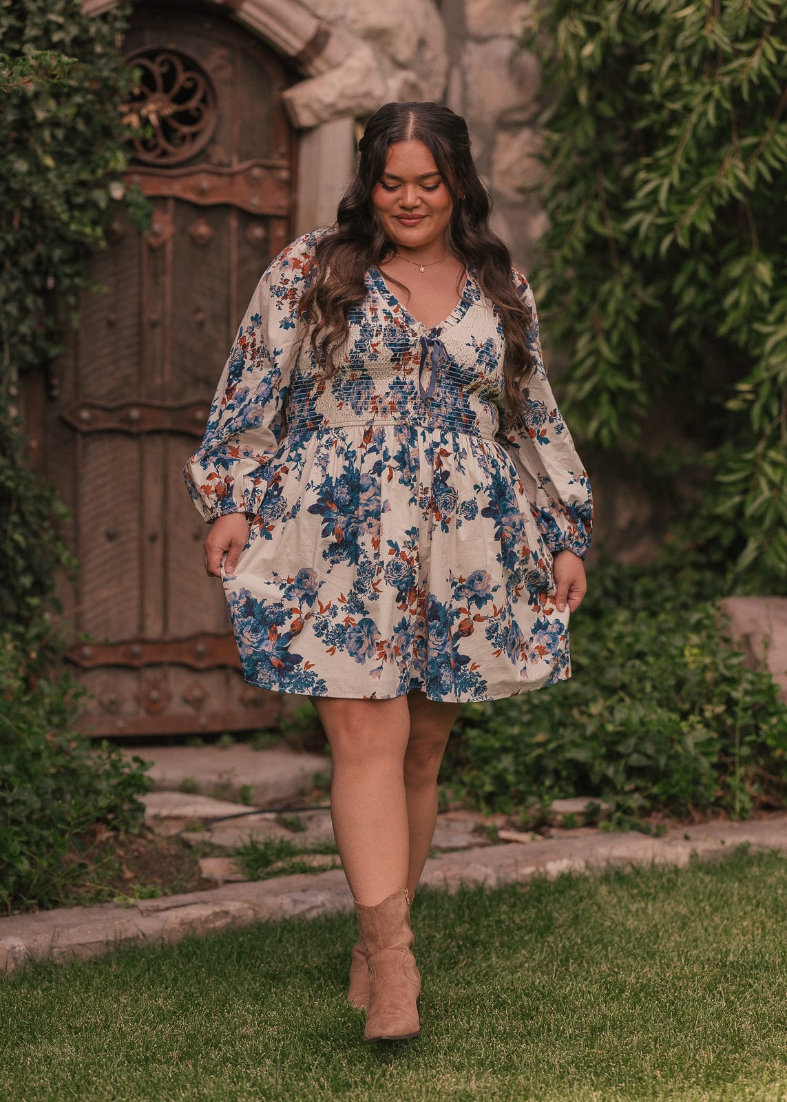 chic size inclusive model wearing JessaKae Hailey Dress