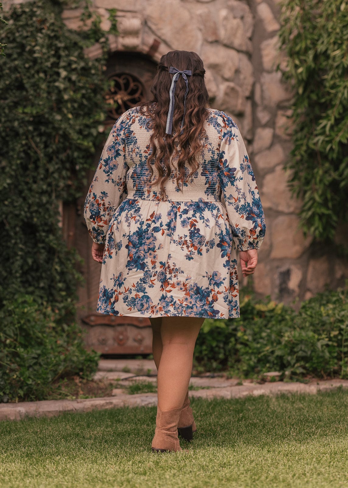 chic size inclusive model wearing JessaKae Hailey Dress