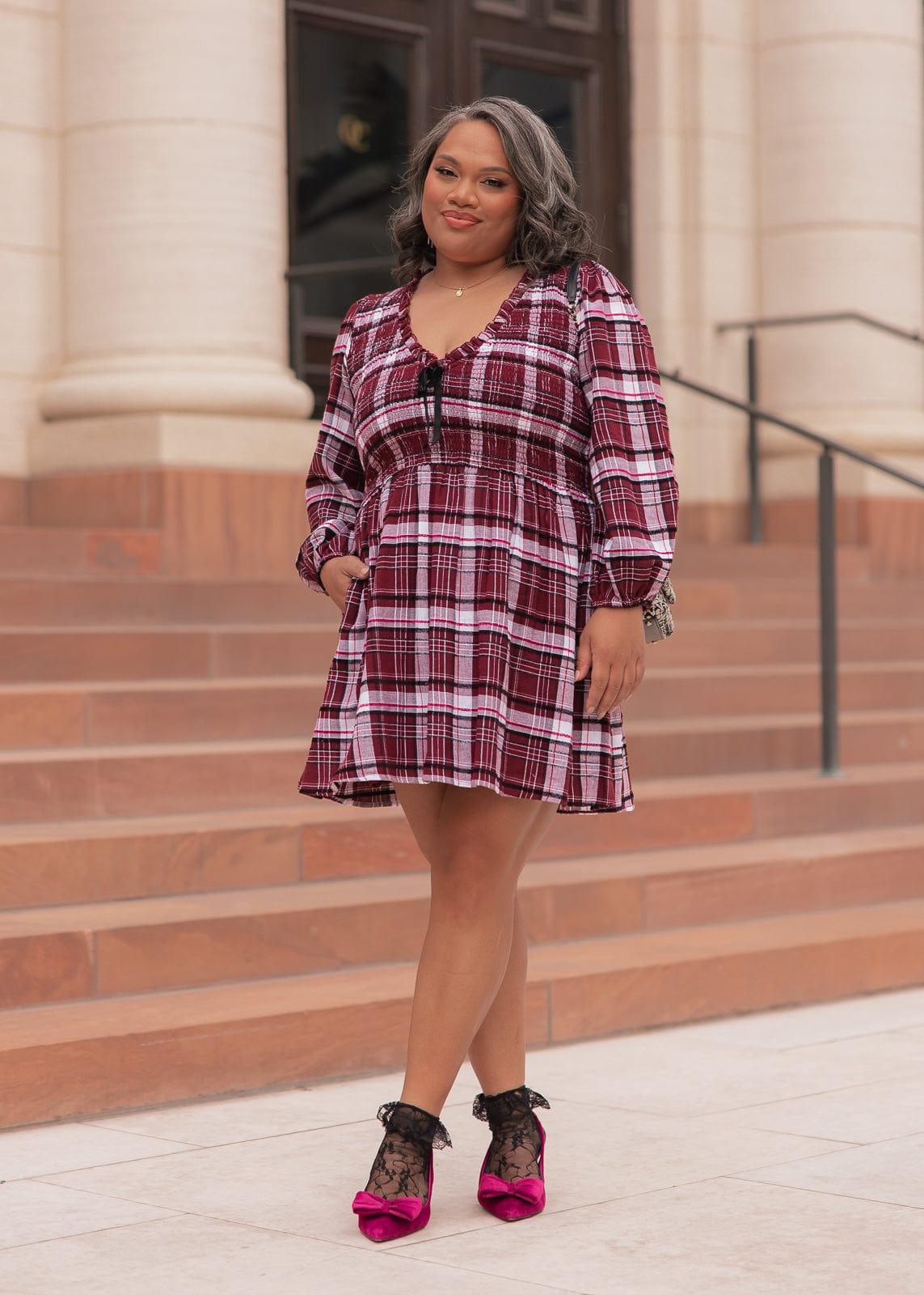 chic size inclusive model wearing JessaKae Hailey Dress