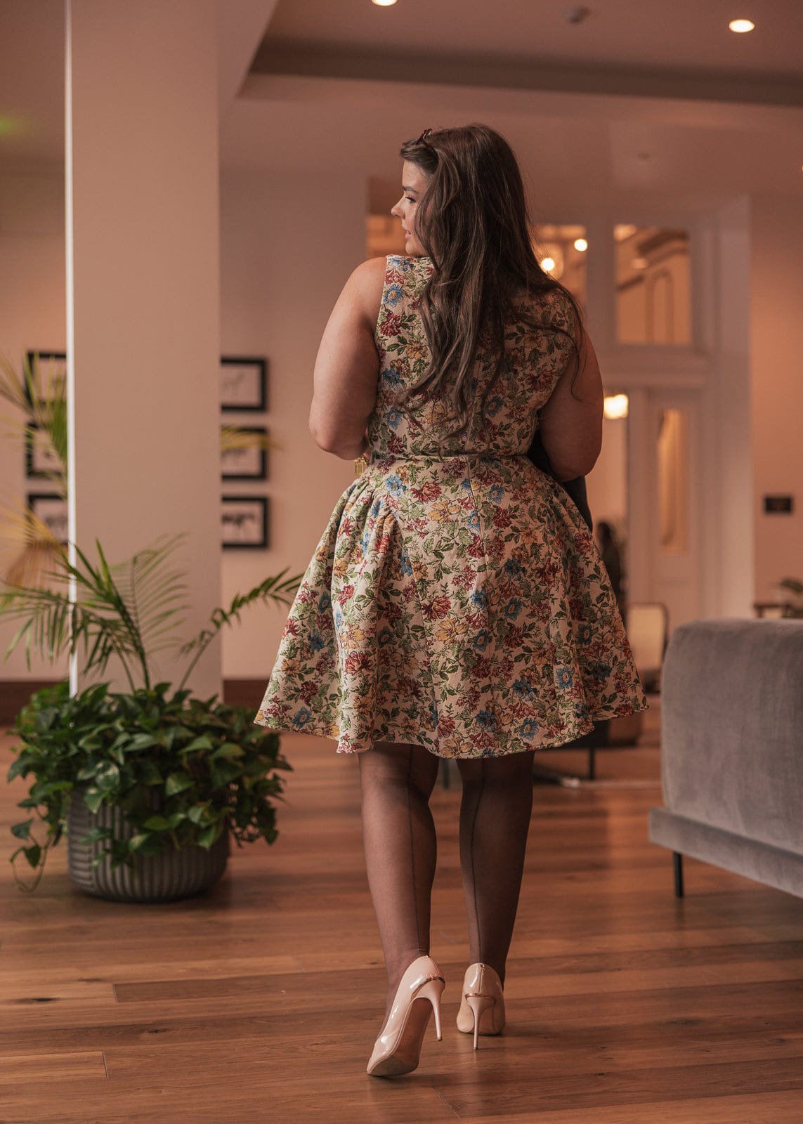 chic size inclusive model wearing JessaKae Hazel Dress