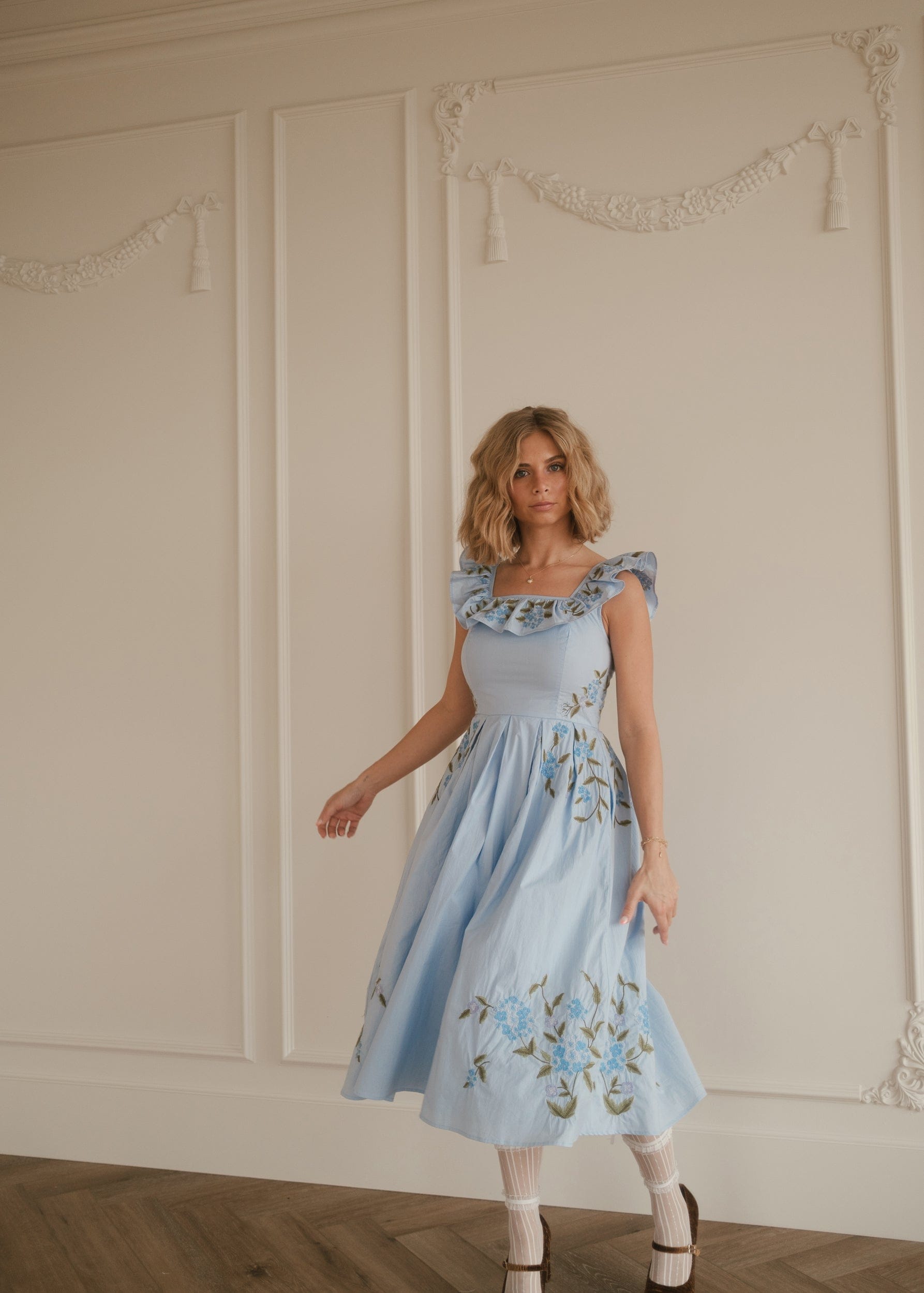 chic size inclusive model wearing JessaKae Hydrangea Dress Dresses