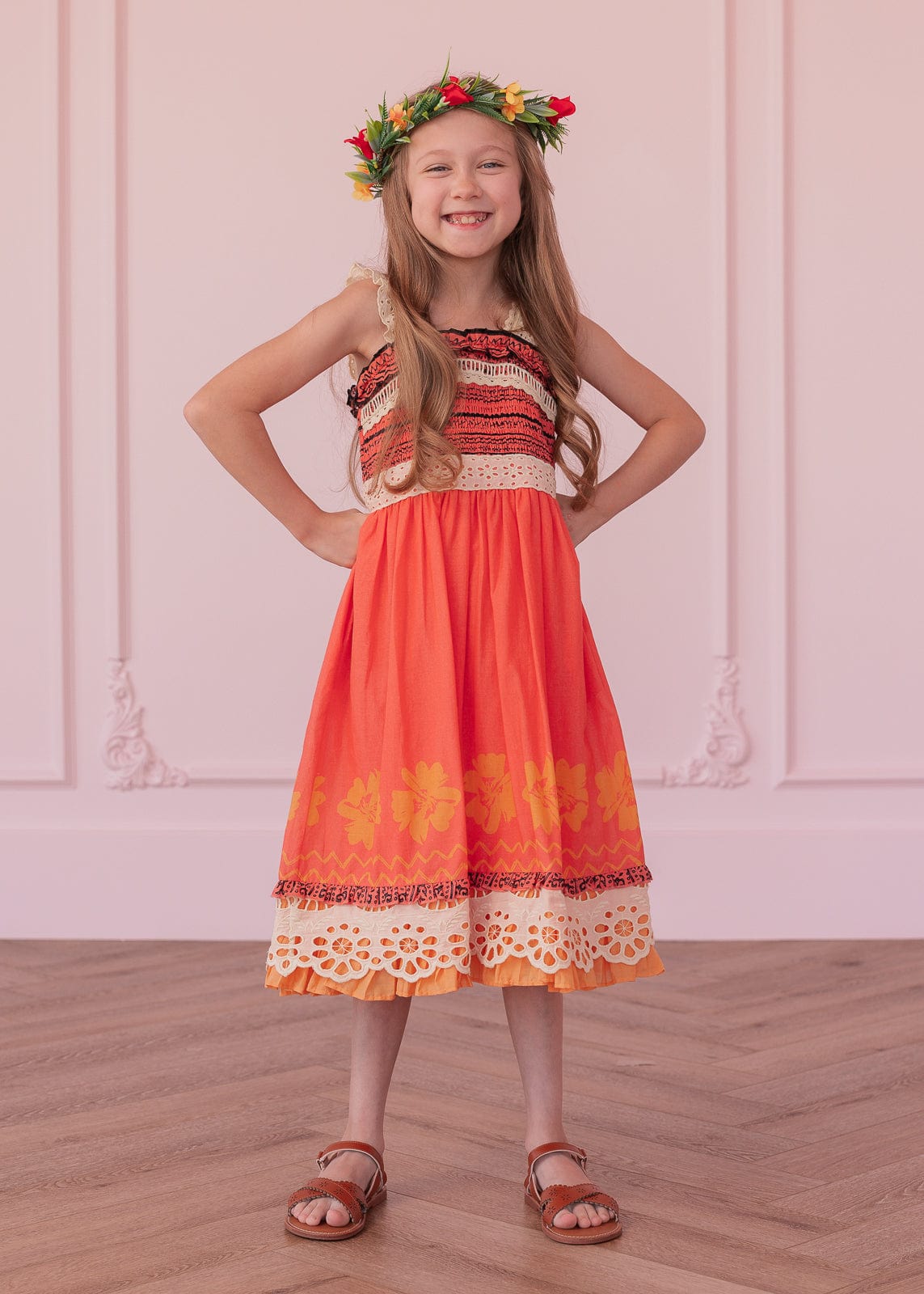 chic size inclusive model wearing JessaKae Island Princess Girls Dress