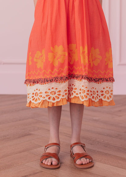 chic size inclusive model wearing JessaKae Island Princess Girls Dress