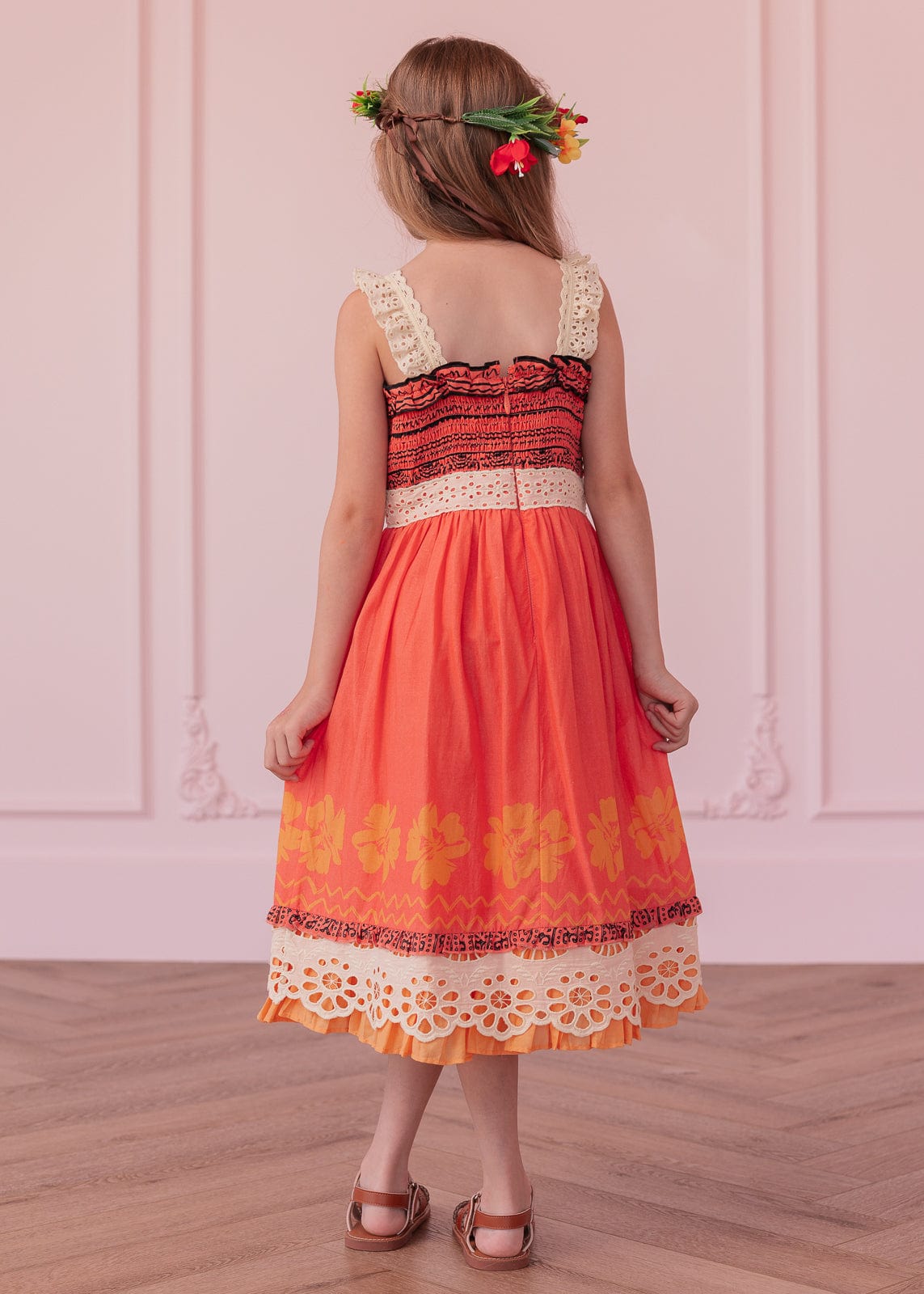 chic size inclusive model wearing JessaKae Island Princess Girls Dress