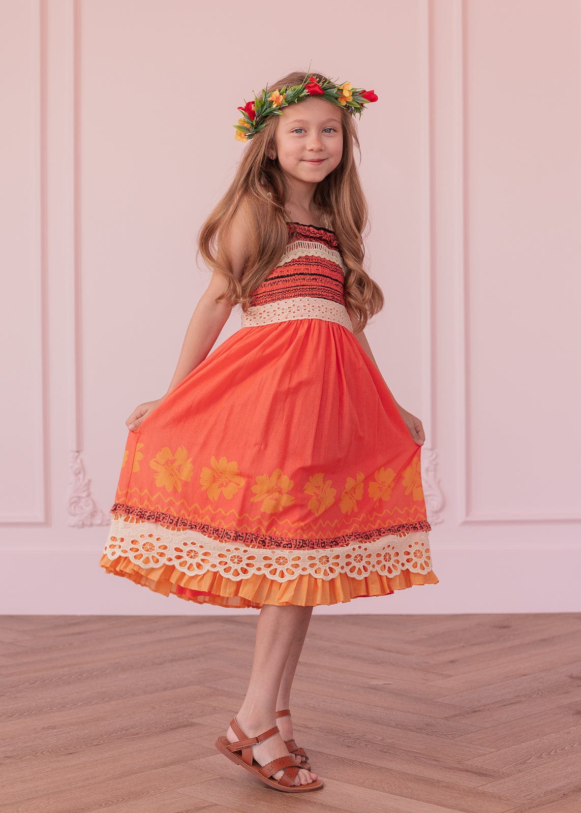 chic size inclusive model wearing JessaKae Island Princess Girls Dress