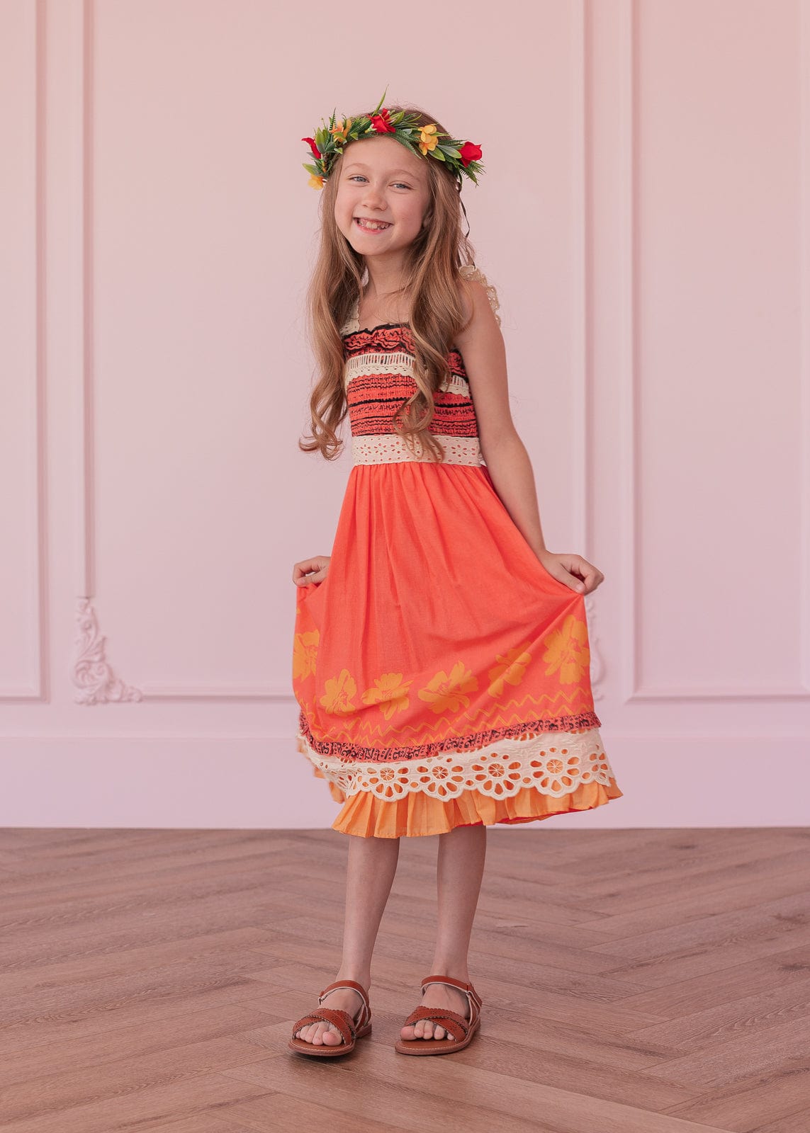 chic size inclusive model wearing JessaKae Island Princess Girls Dress