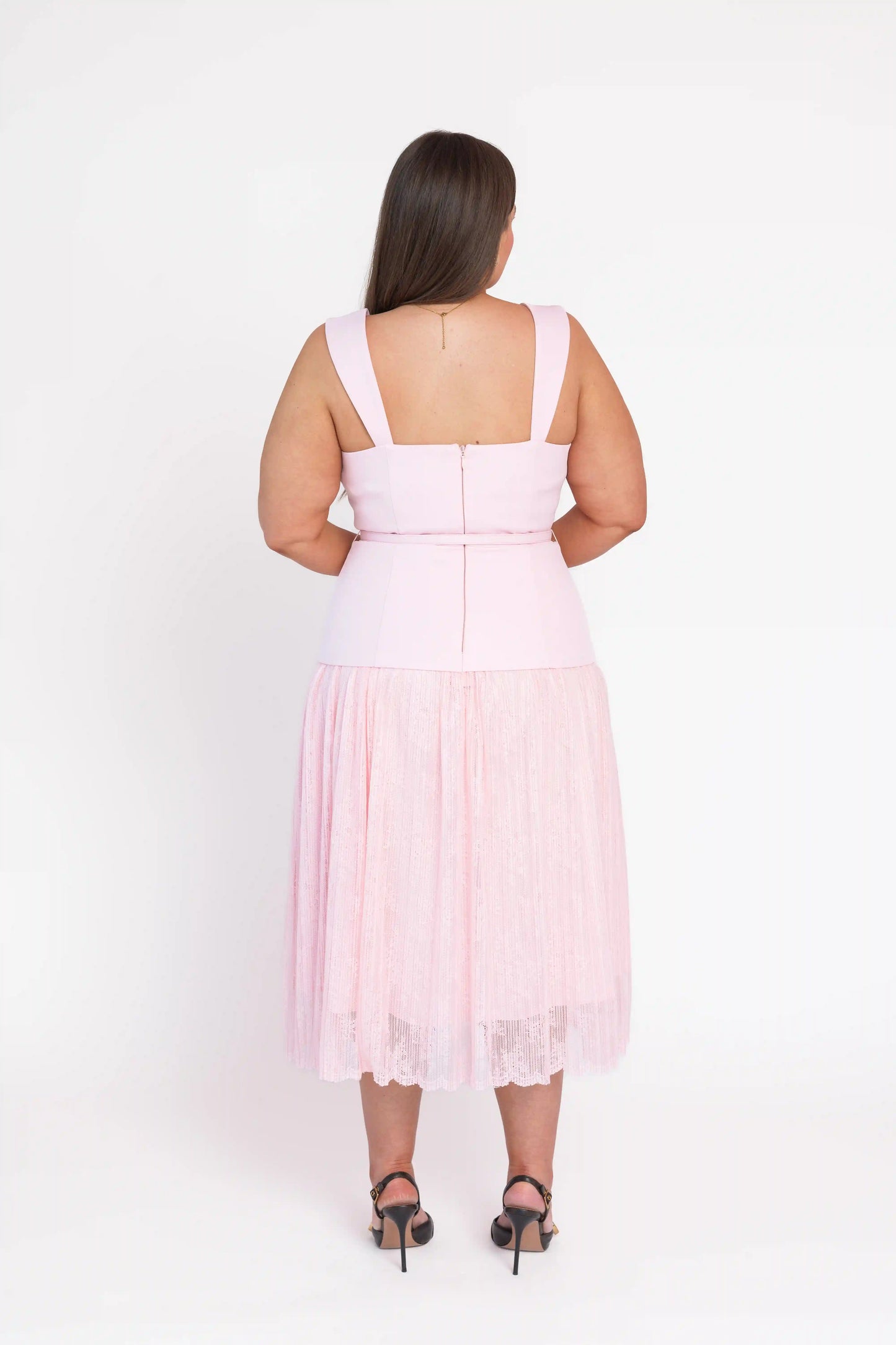 chic size inclusive model wearing JessaKae Jackie Peplum Belted Dress - Pink