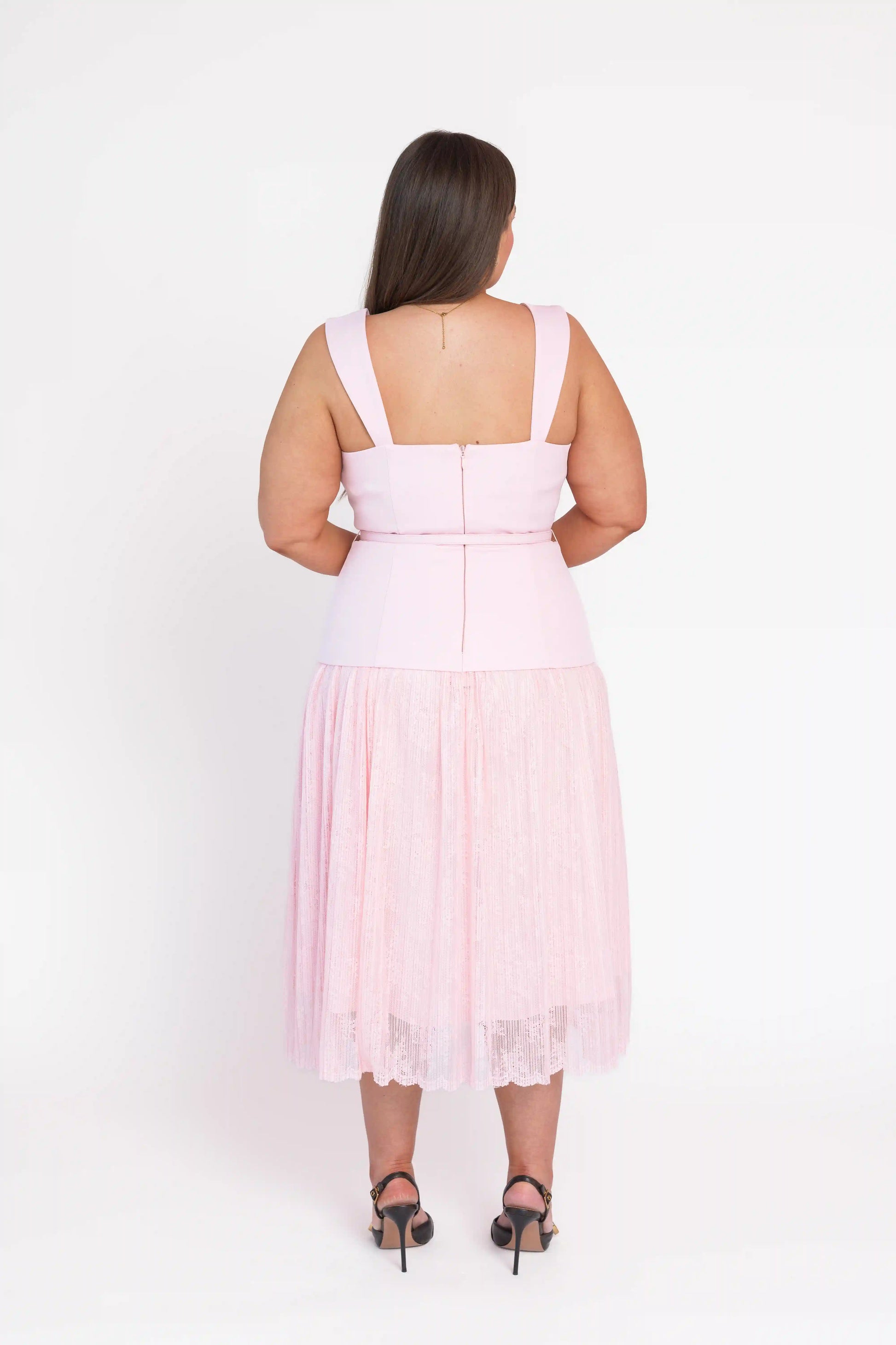 chic size inclusive model wearing JessaKae Jackie Peplum Belted Dress - Pink