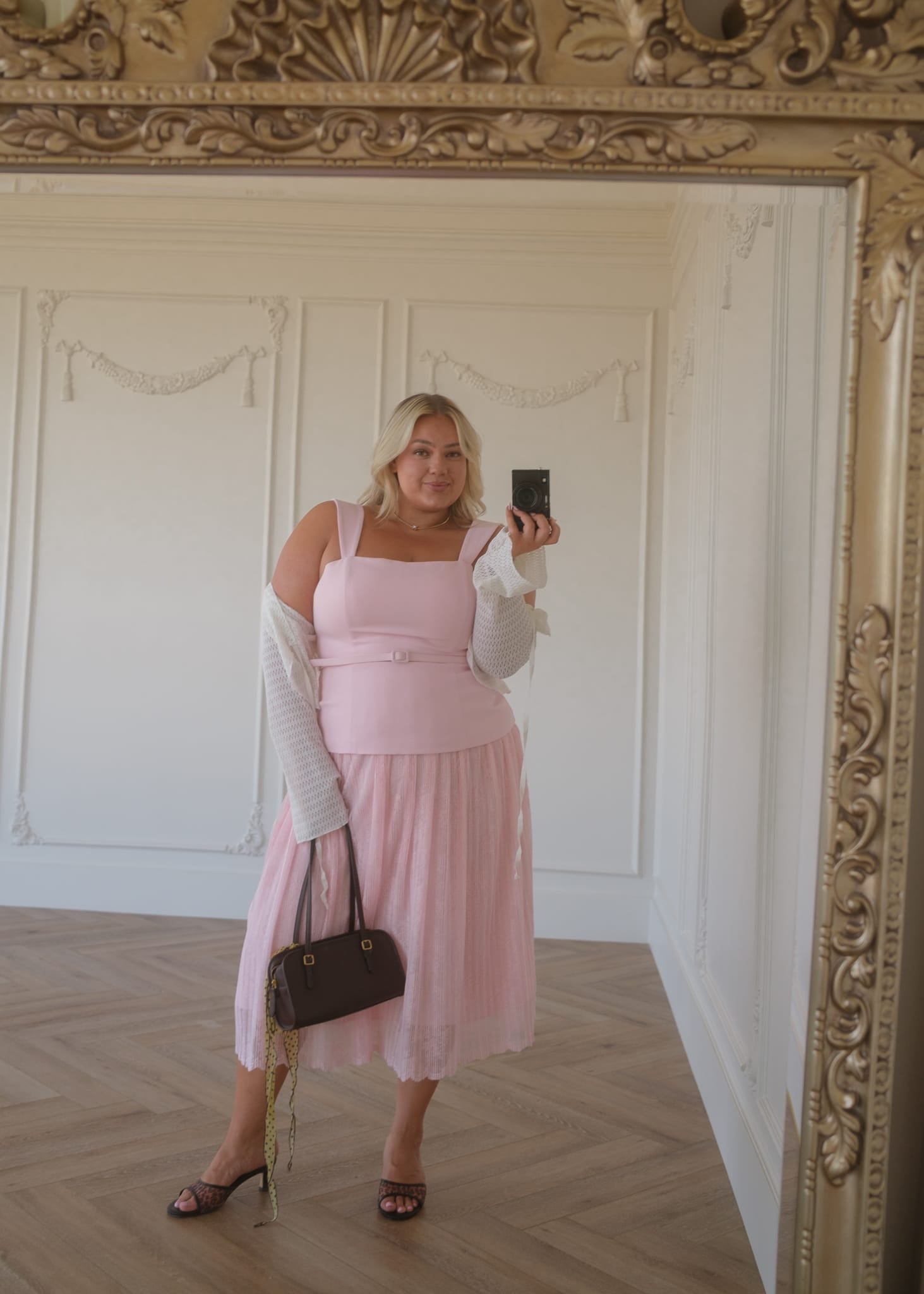 chic size inclusive model wearing JessaKae Jackie Peplum Belted Dress - Pink Dresses