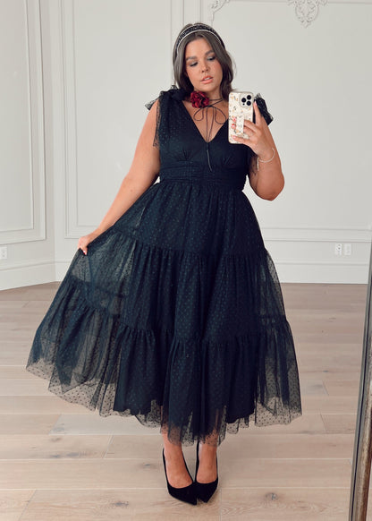 chic size inclusive model wearing JessaKae Jeanne Dress Black Dresses