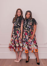 chic size inclusive model wearing JessaKae Jubilee Dress Dresses