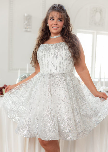 chic size inclusive model wearing JessaKae Jules Dress