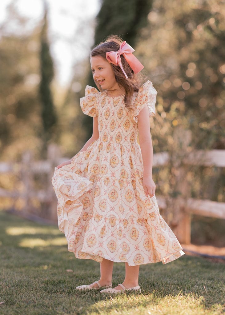 chic size inclusive model wearing JessaKae Katie Girls Dress