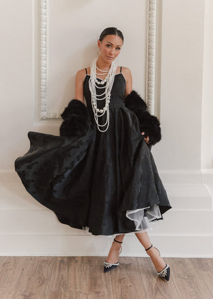 chic size inclusive model wearing JessaKae Kelly Dress