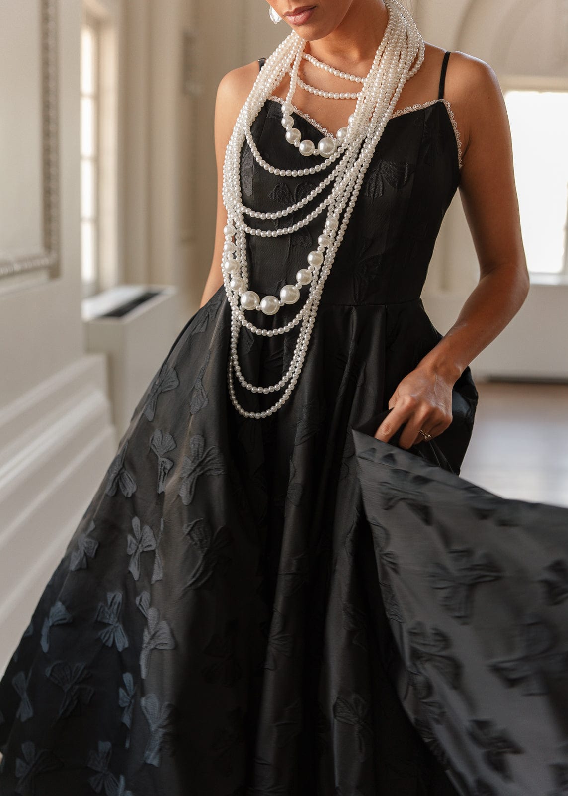 chic size inclusive model wearing JessaKae Kelly Dress