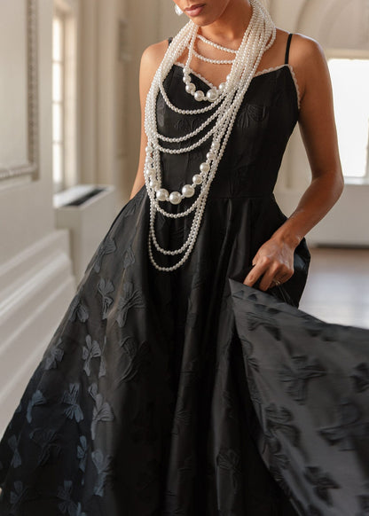 chic size inclusive model wearing JessaKae Kelly Dress