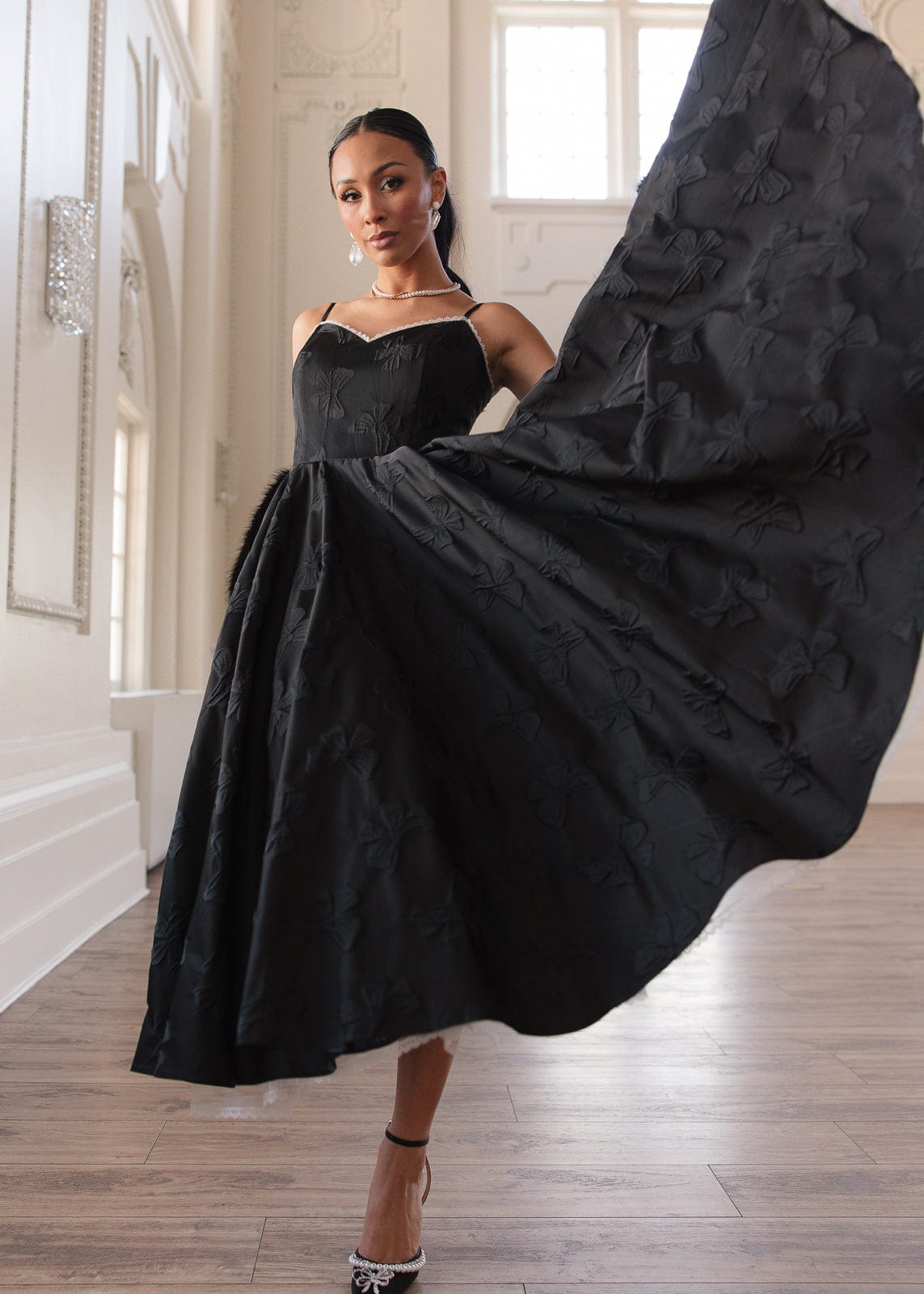 chic size inclusive model wearing JessaKae Kelly Dress