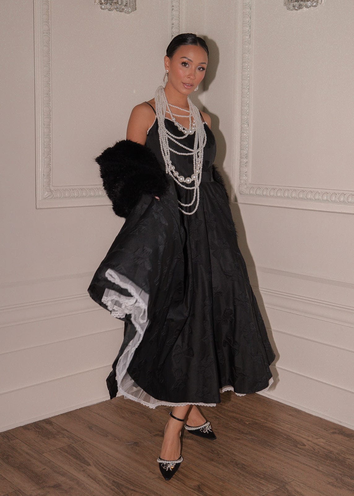 chic size inclusive model wearing JessaKae Kelly Dress