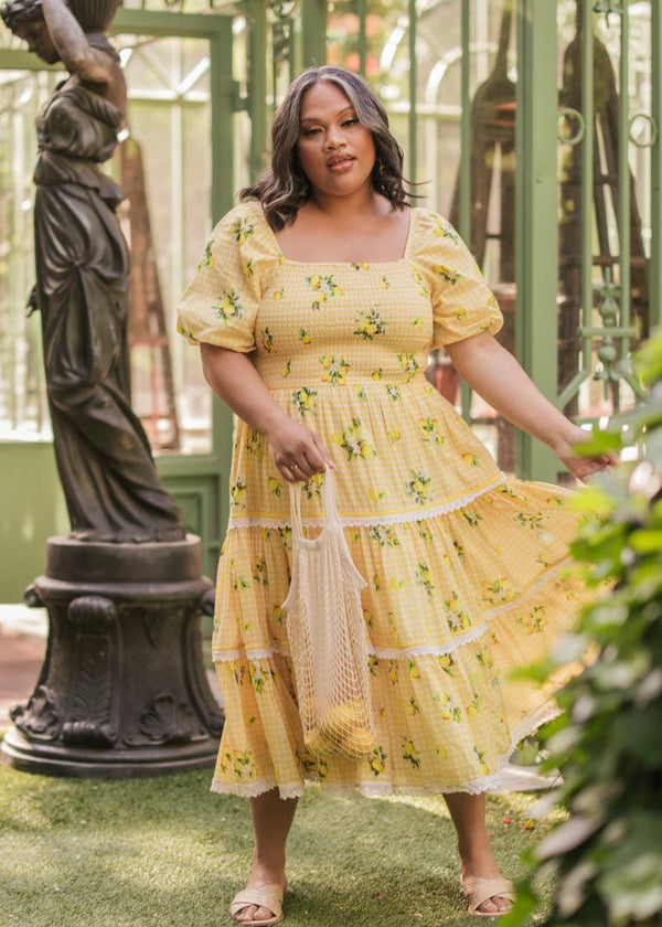 chic size inclusive model wearing JessaKae Lemon Meringue Dress