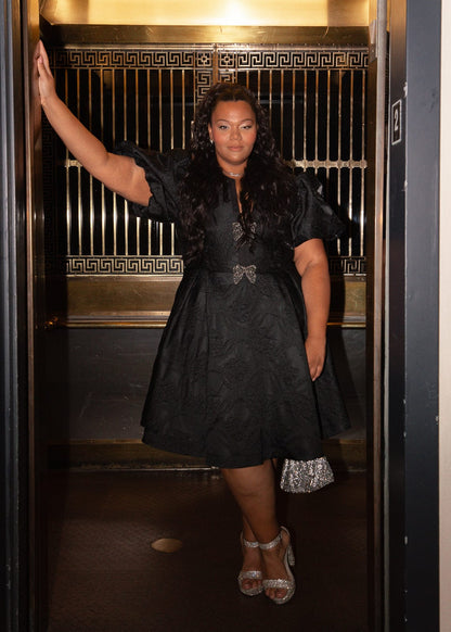 chic size inclusive model wearing JessaKae Lennon Dress