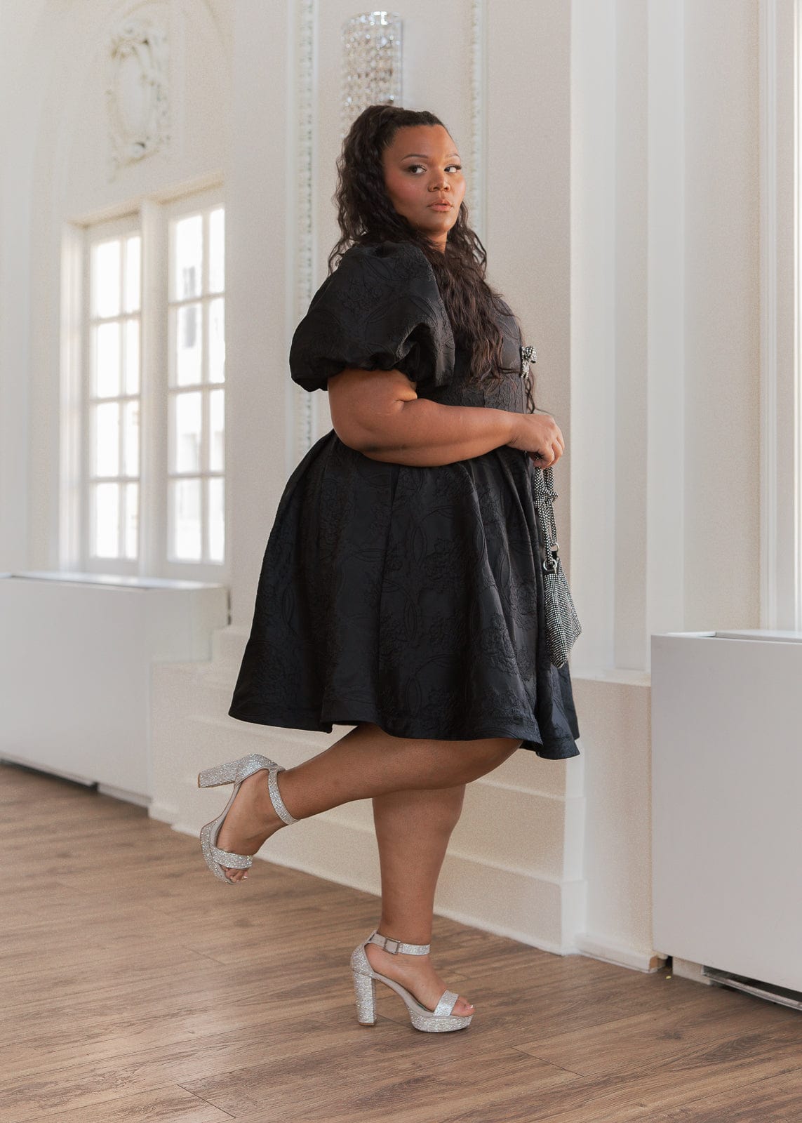 chic size inclusive model wearing JessaKae Lennon Dress