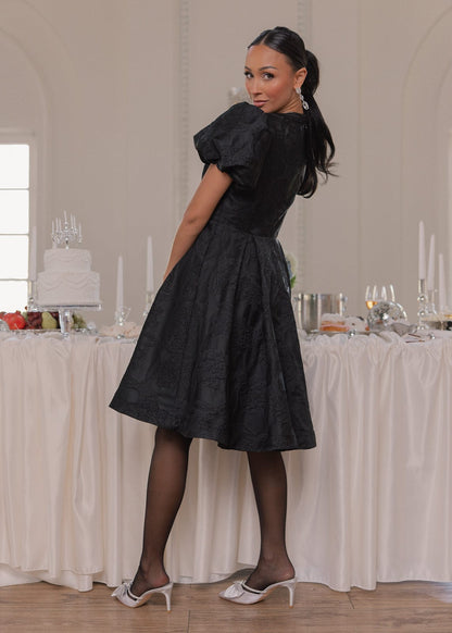 chic size inclusive model wearing JessaKae Lennon Dress