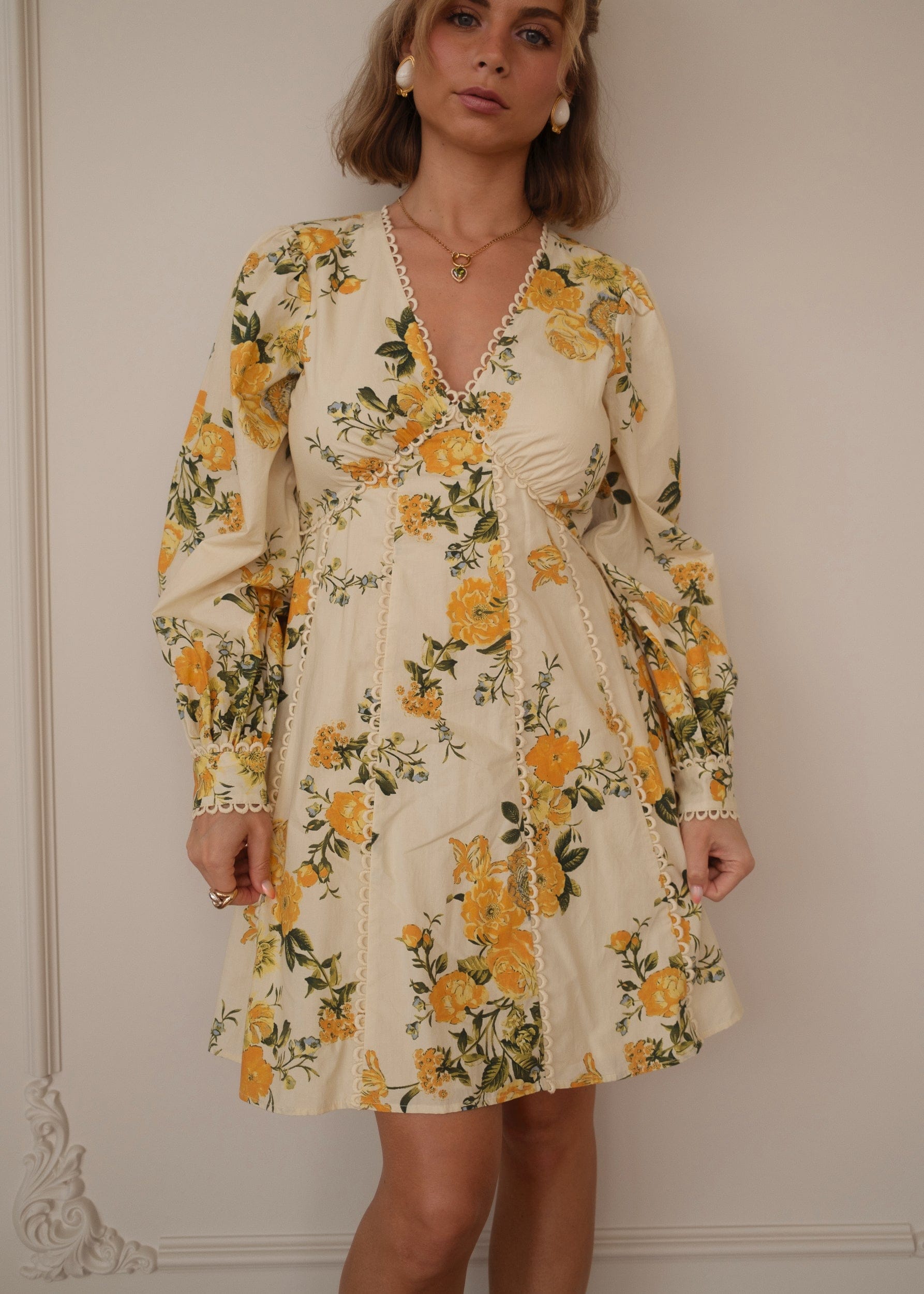 chic size inclusive model wearing JessaKae Lettie Dress