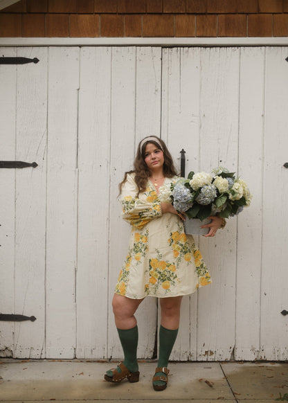 chic size inclusive model wearing JessaKae Lettie Dress